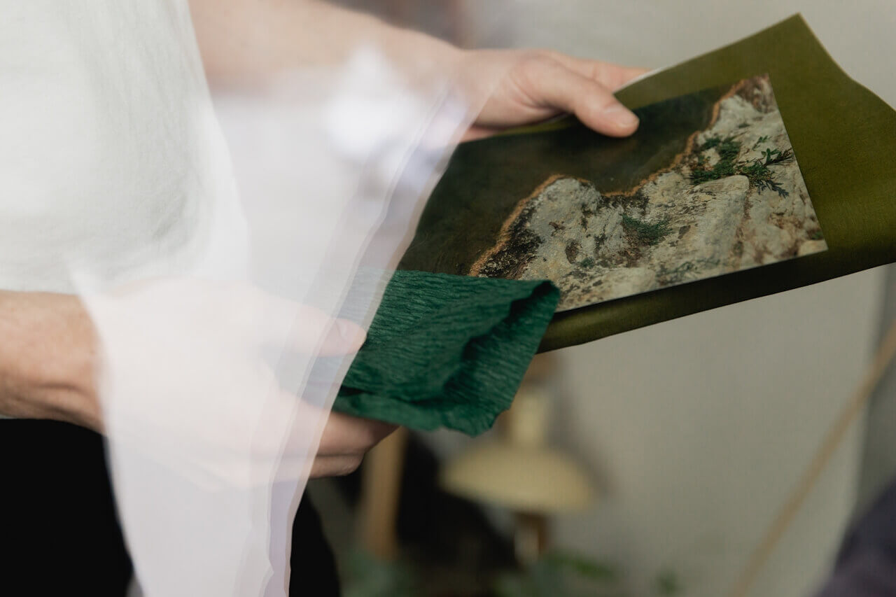 Photo of hands holding material